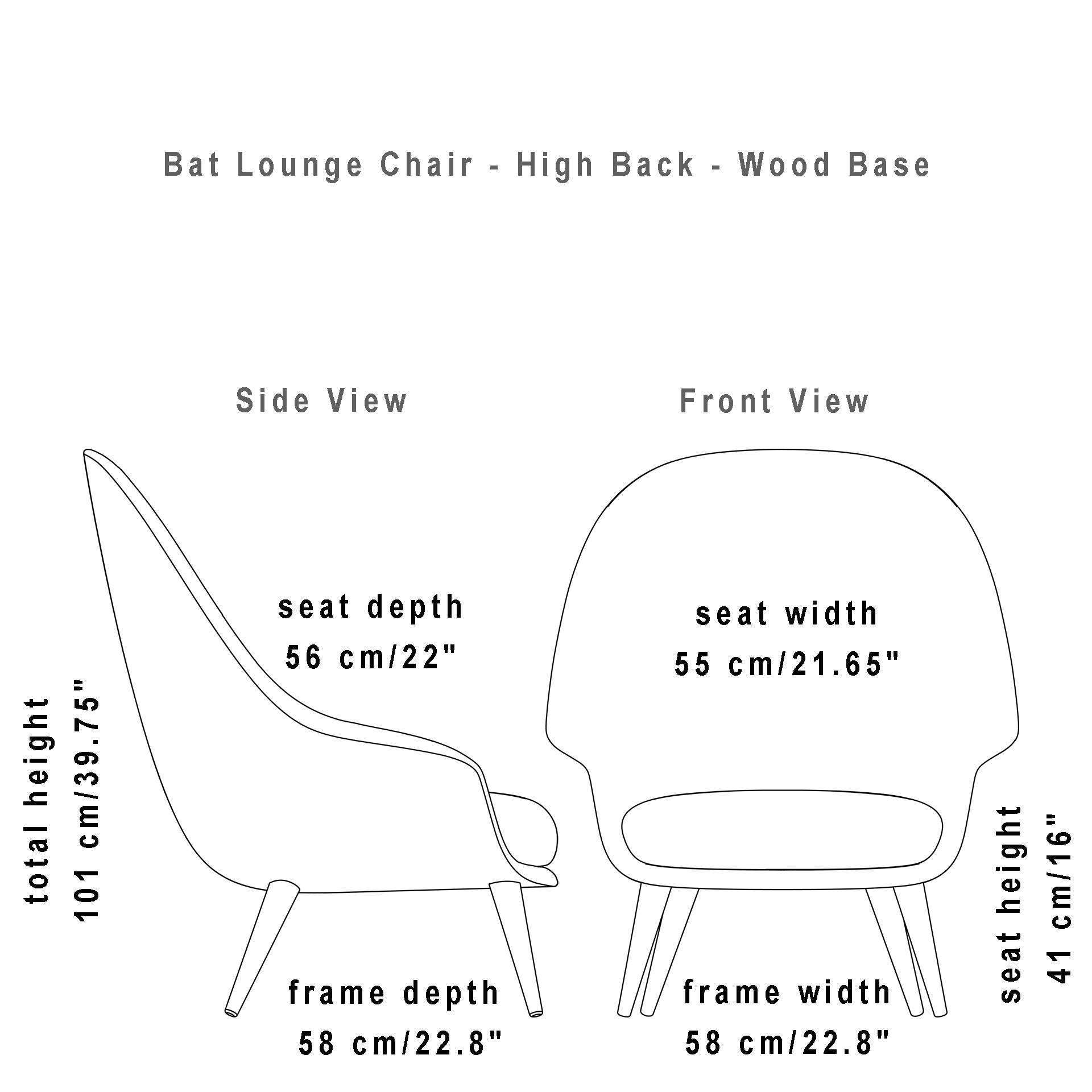 GUBI Bat Lounge Chair Fully Upholstered High Back Wood Base. kelli